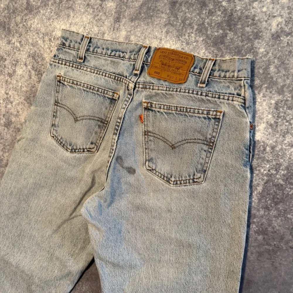 VTG Levis 550 Orange Tab Relaxed Fit Tapered Leg Jeans 33x32 Light Wash Made USA